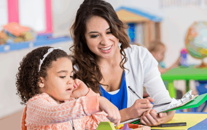 Teacher with student